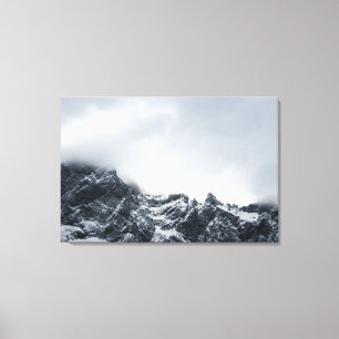 Sharp edges of mountains and soft clouds canvas print