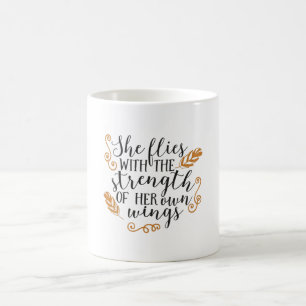 She flies with the strength of her own wings coffee mug