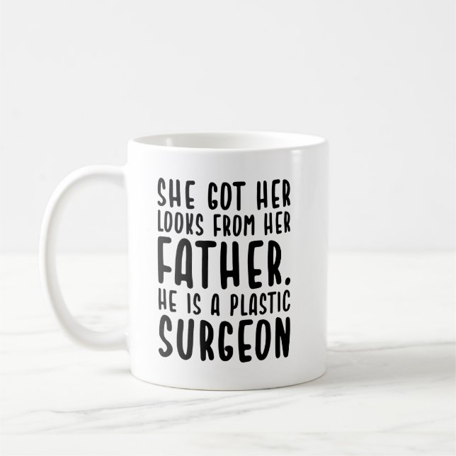 She Got Her Looks From Father He's Plastic Surgeon Coffee Mug (Left)