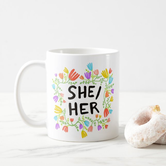 SHE/HER Pronouns Rainbow Floral Wreath Colourful Coffee Mug (With Donut)
