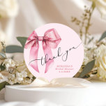 She is tying the knot Pink Bow Bridal Thank you Classic Round Sticker<br><div class="desc">She is tying the knot Pink Bow Bridal Thank you Classic Round Sticker
Matching items are available.</div>