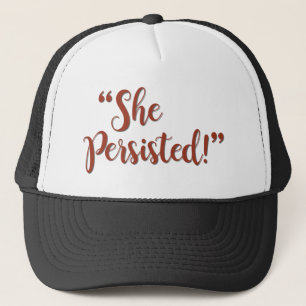 SHE PERSISTED TRUCKER HAT
