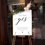 She Said Yes Calligraphy Bridal Shower Sign<br><div class="desc">Elevate your bridal shower decor with the "She Said Yes Calligraphy Bridal Shower Sign." This minimalist and elegant sign features classic black calligraphy, making it a stylish addition to your bridal shower. Whether you use it as a welcome sign for your engagement party or bridal shower, it will set the...</div>