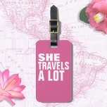 She Travels a Lot, Pink Luggage Tag<br><div class="desc">Fun and feminine typography design with bold white text 'SHE TRAVELS A LOT' in a pink-tag, and with additional information at the back... for a woman who is always travelling. A luggage tag with a name is important for several practical reasons when travelling. Firstly, it serves as a quick and...</div>