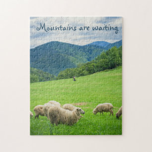 Sheep on meadow under the mountain  jigsaw puzzle