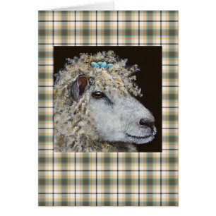 sheep with nest card on plaid