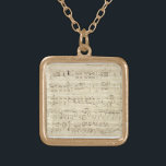 Sheet Music on Parchment Handwritten in Ink Gold Plated Necklace<br><div class="desc">Old vintage sheet music handwritten in black ink on an antique beige parchment with notes. Memories from a time long ago,  when music was handwritten in ink. Notations and scribblings on the side give it a personal touch.</div>