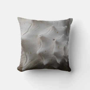 shell: almost solid white cream tan grey pillow