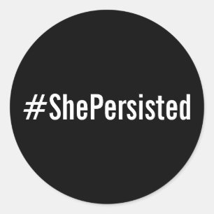 #ShePersisted, white text on black stickers