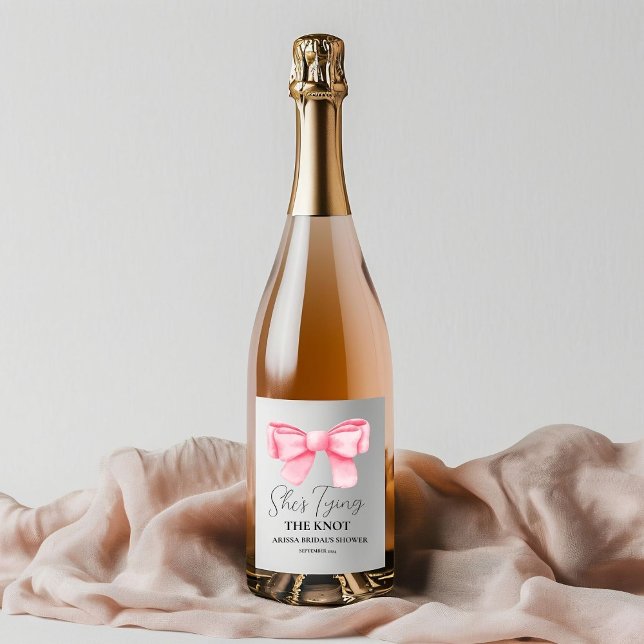 She's tying the knot Bridal Shower Pink Bow Sparkling Wine Label (Creator Uploaded)