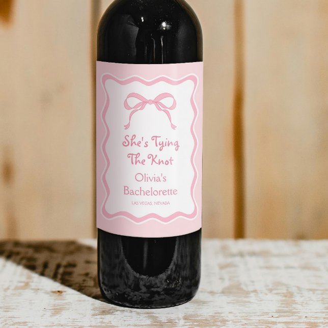She's Tying the knot Pink Bow Bachelorette Party Wine Label (Creator Uploaded)