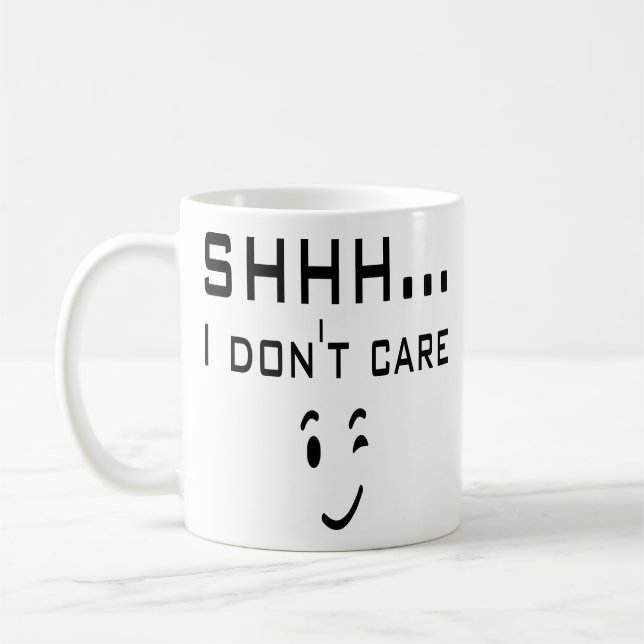 Shhh. I Don't Care Funny Smile Wink Emoji Emoticon Coffee Mug (Left)