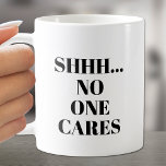 SHHH... No One Cares Coffee Mug<br><div class="desc">If you need your coffee first, this cup is for you! SHHHH... NO ONE CARES printed on both sides. Choose your mug style, handle colour, inside colour and change the background colour to anything. Perfect for birthday gift, mother's day gift, father's day gift, co-worker gift, Christmas gift, gift for your...</div>
