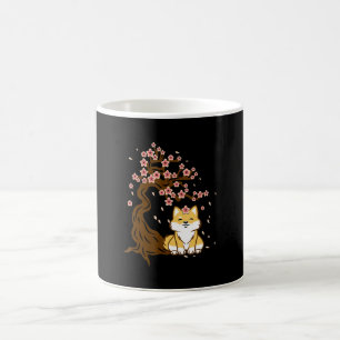 Shiba inu dog sitting under cherry blossoms tree coffee mug