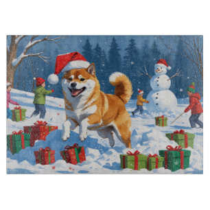 Shiba Inu Running in Snow with Christmas Hat Cutting Board