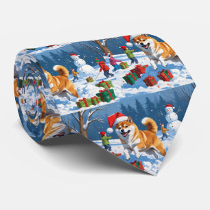 Shiba Inu Running in Snow with Christmas Hat Tie