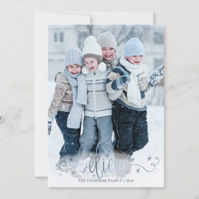 Shimmering Winter Blue BELIEVE Handwritten Script Holiday Card (Front)