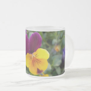 Shining pansies frosted glass coffee mug