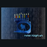 Shiny Blue Chanukkah Menorah Cutting Board<br><div class="desc">A modernistic,  metallic,  blue Chanukkah menorah,  featuring a lion in silhouette,  against a dark,  night-like background. All nine of the candles are lit. Hebrew text reading "Chag Chanukkah Sameach" (Happy Hanukkah) also appears in glowing blue and white.</div>