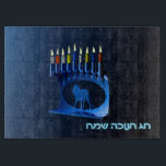 Shiny Blue Chanukkah Menorah Cutting Board<br><div class="desc">A modernistic,  metallic,  blue Chanukkah menorah,  featuring a lion in silhouette,  against a dark,  night-like background. All nine of the candles are lit. Hebrew text reading "Chag Chanukkah Sameach" (Happy Hanukkah) also appears in glowing blue and white.</div>