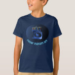Shiny Blue Chanukkah Menorah T-Shirt<br><div class="desc">A modernistic,  metallic,  blue Chanukkah menorah,  featuring a lion in silhouette,  against a dark,  night-like background. All nine of the candles are lit. Hebrew text reading "Chag Chanukkah Sameach" (Happy Hanukkah) also appears in glowing blue and white.</div>
