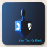 Shiny Blue Dreidel Coaster<br><div class="desc">A modernistic,  metallic blue dreidel against a dark,  night-like background.  Two of the Hebrew letters found on a dreidel,  nun and shin,  glow brightly.  Add your own text.</div>