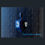 Shiny Blue Dreidel Cutting Board<br><div class="desc">A modernistic,  metallic blue dreidel against a dark,  night-like background.  Two of the Hebrew letters found on a dreidel,  nun and shin,  glow brightly.  Add your own text.</div>