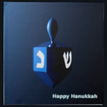 Shiny Blue Dreidel Napkin<br><div class="desc">A modernistic, metallic blue dreidel against a dark, night-like background. Two of the Hebrew letters found on a dreidel, nun and shin, glow brightly. Text reading "Happy Hanukkah" also appears in glowing blue and white.</div>
