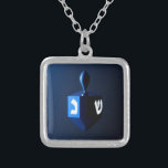 Shiny Blue Dreidel Silver Plated Necklace<br><div class="desc">A modernistic,  metallic blue dreidel against a dark,  night-like background.  Two of the Hebrew letters found on a dreidel,  nun and shin,  glow brightly.</div>