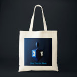 Shiny Blue Dreidel Tote Bag<br><div class="desc">A modernistic, metallic blue dreidel against a dark, night-like background. Two of the Hebrew letters found on a dreidel, nun and shin, glow brightly. Add your own text.</div>