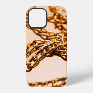 Shiny golden chains on reflective surface. Seamles iPhone 12 Case