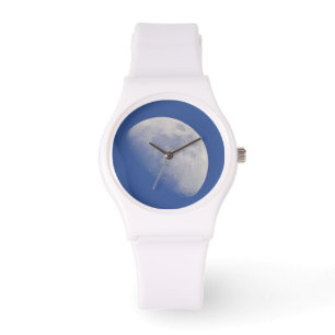 Shiny moon in blue sky watch