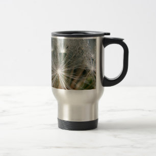 Shiny waterdrops on a white dandelion travel mug