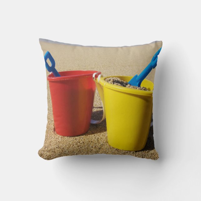 Shovels And Pails On Sandy Beach Cushion (Front)