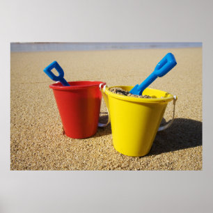 Shovels And Pails On Sandy Beach Poster