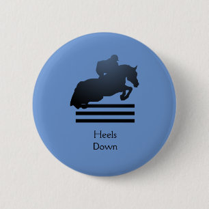 Show jumper clearing an obstacle. 6 Cm Round Badge
