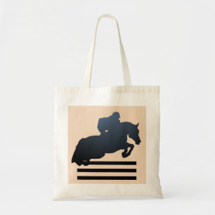 Show jumper clearing an obstacle. Tote Bag