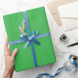 shows green vinyl wrap in two views wrapping paper