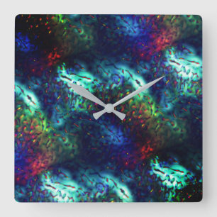 Showy scales on a dark blue to coloured background square wall clock