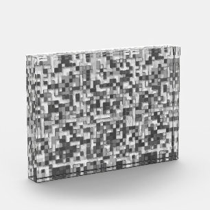 Shuffled small squares in tones of grey to clear photo block