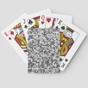 Shuffled small squares in tones of grey to clear playing cards