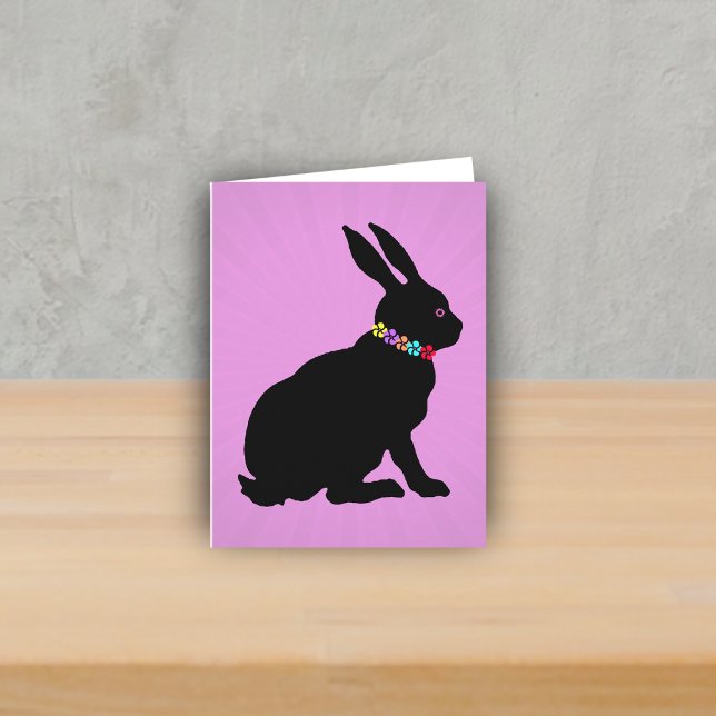Side Profile sitting Black Rabbit Flowers Pink Eye Card (Black silhouette sitting rabbit wearing colourful flowers on spring or Easter note card.)