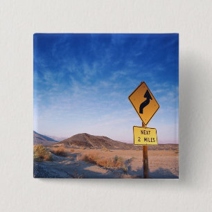 Sign on the death valley road in sunset 15 cm square badge