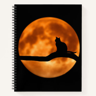 Silhouette of a Black Cat in a Tree Notebook