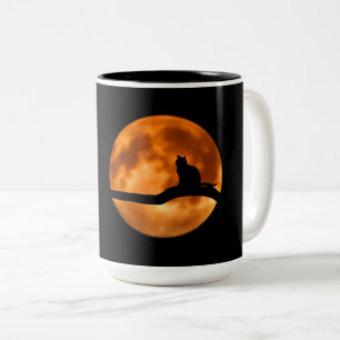 Silhouette of a Black Cat in a Tree Two-Tone Coffee Mug