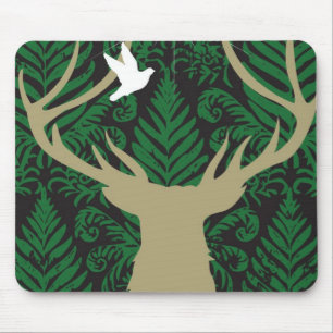 Silhouette of a deer, a dove and a star against a mouse mat