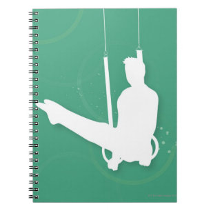 Silhouette of a man performing gymnastics notebook