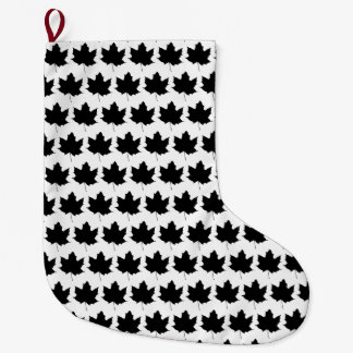 Silhouette of a maple leaf large christmas stocking