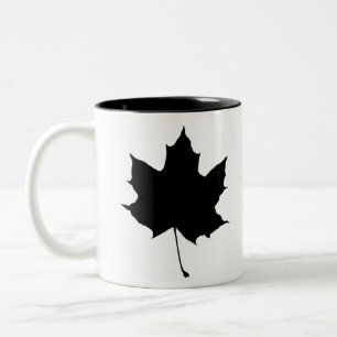 Silhouette of a maple leaf Two-Tone coffee mug