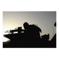 Silhouette of a Squad Automatic Weapon gunner